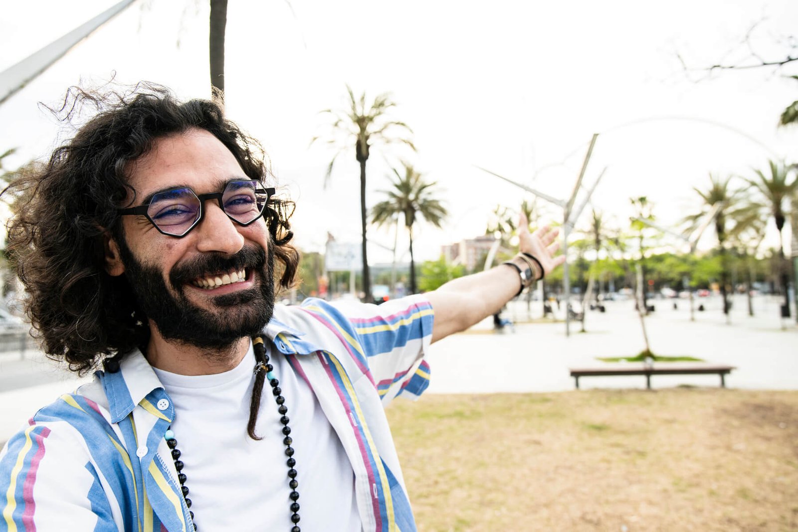 portrait of cheerful happy hipster young man smili 2023 11 27 05 14 24 utc